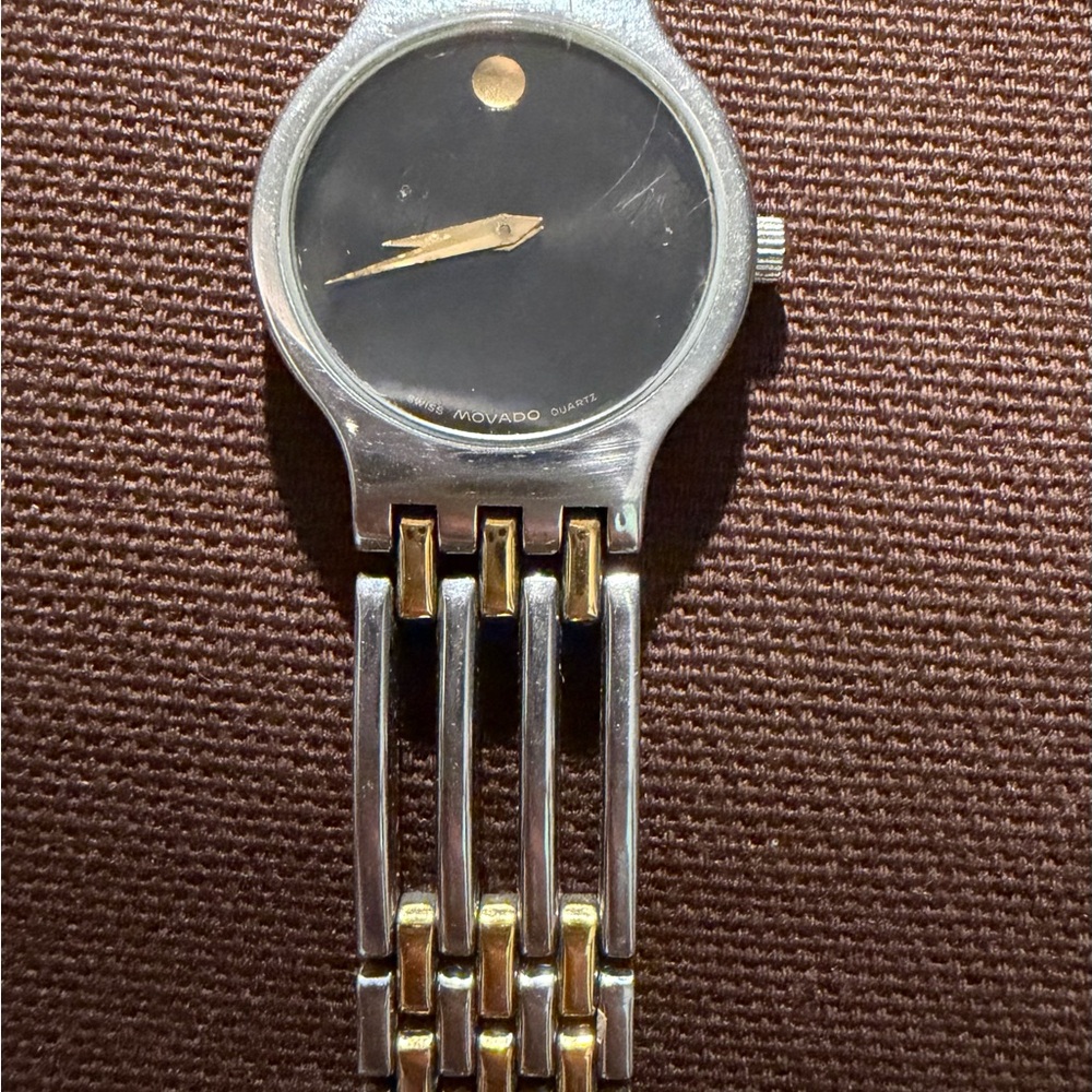 Movado Black Dial Watch with Silver and Gold Accents,